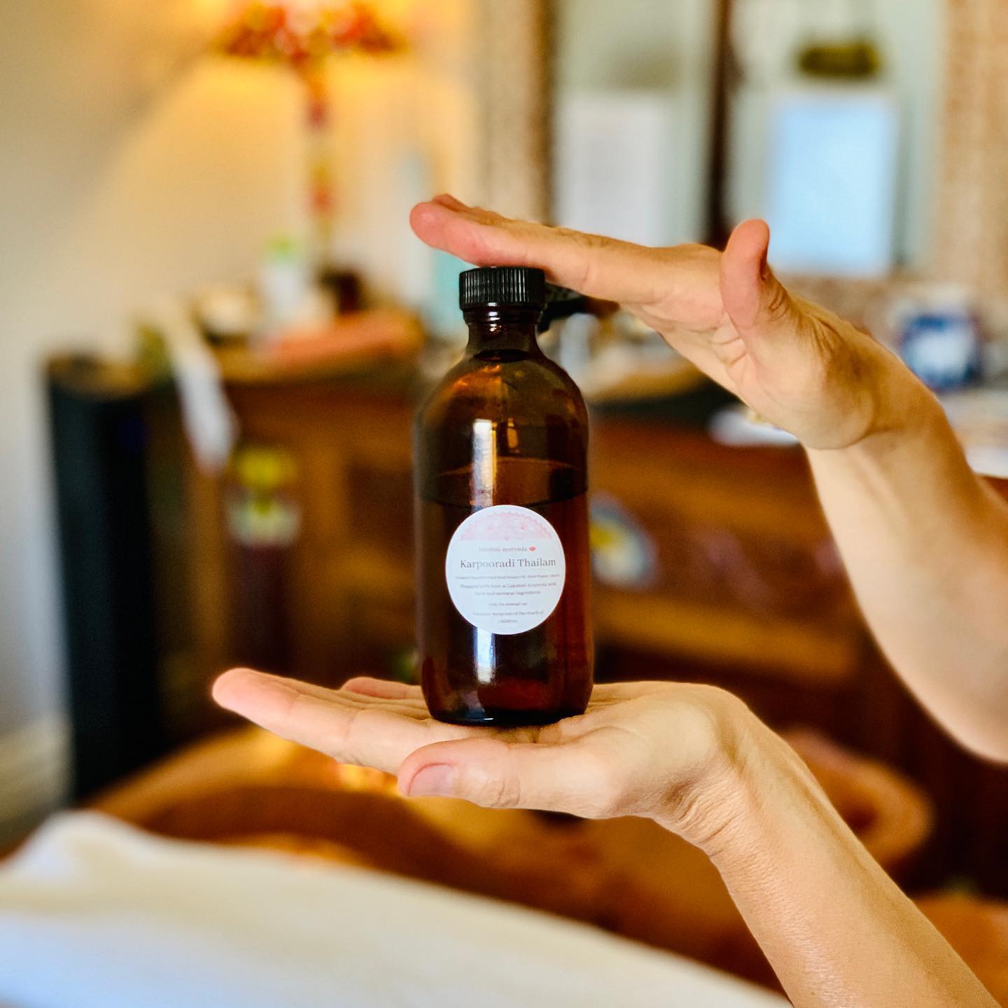 Marta preparing for a treatment with our homemade Karpooradi Thailam!